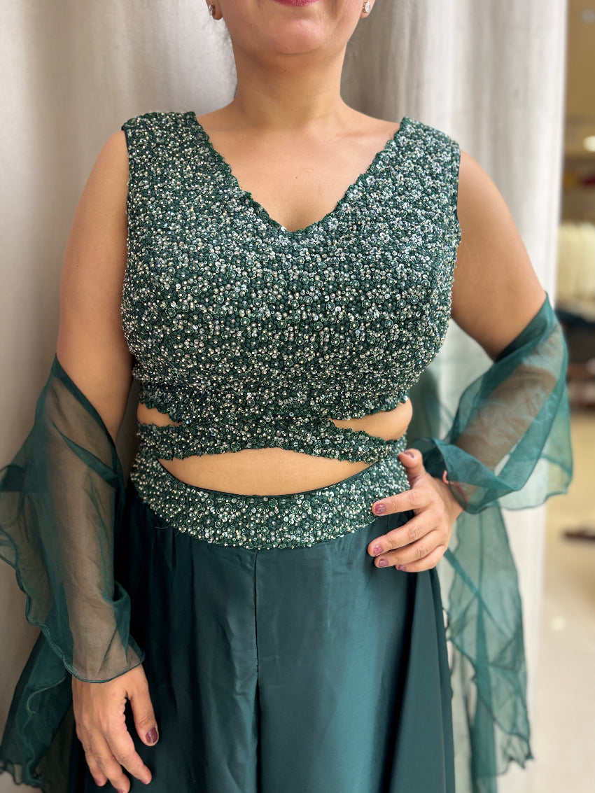 Bottle Green Indo Western with flared palazzo and heavy embroidered blouse