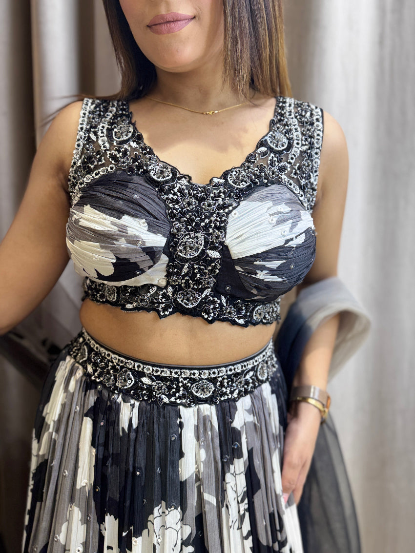 Floral black and white girlish lehenga with hand embroidery on bustier