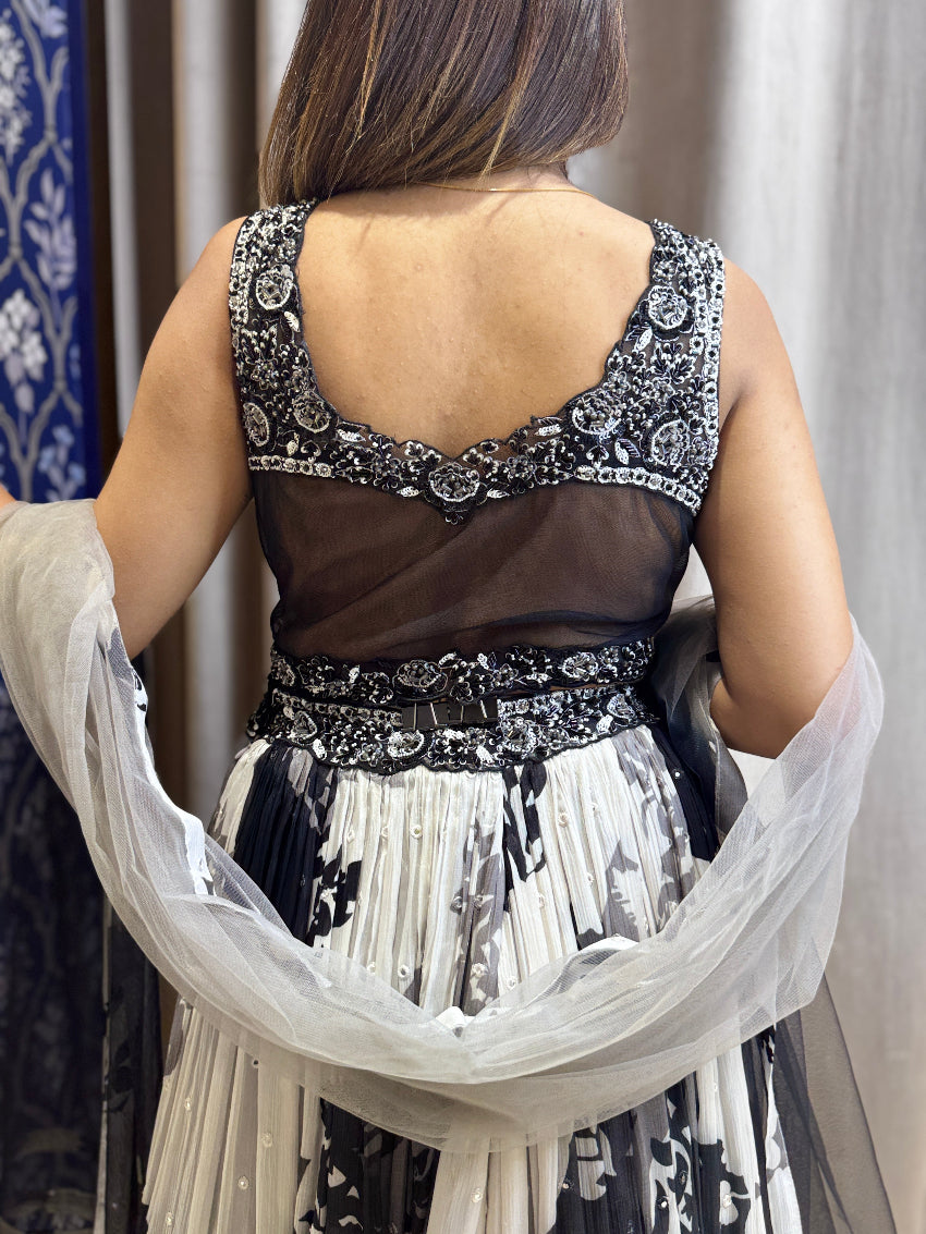 Floral black and white girlish lehenga with hand embroidery on bustier