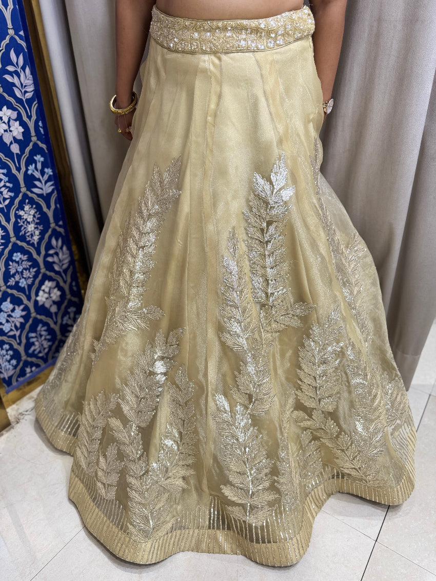 Golden designer lehenga having gota work on skirt and hand embroidery on blouse