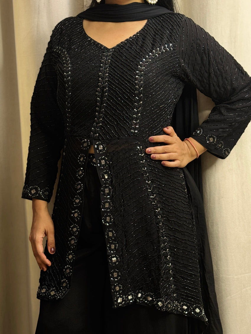 Heavy Black palazzo suit with Asymmetrical Kurta embellished with cutdana and beads