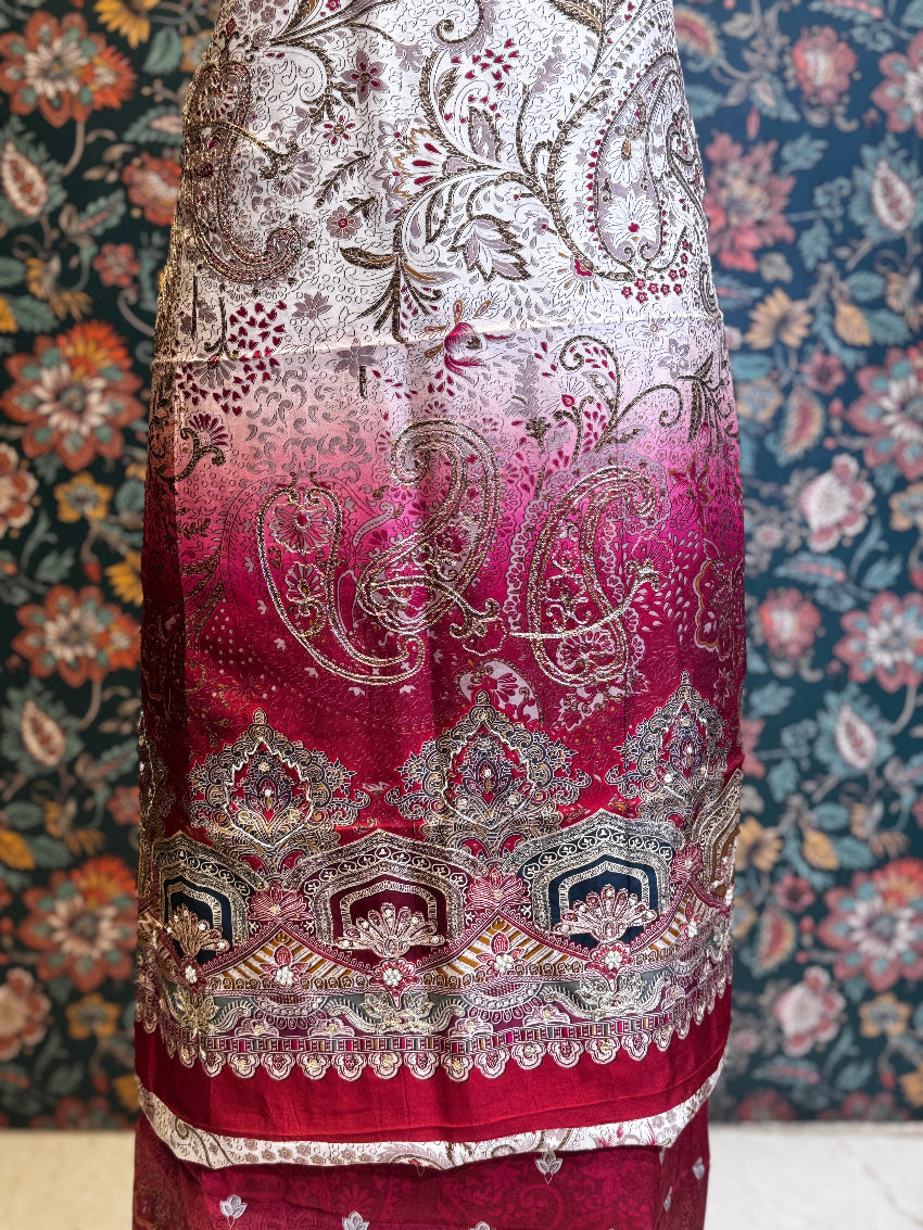 Maroon and white embroidered fabric with a floral patterned background