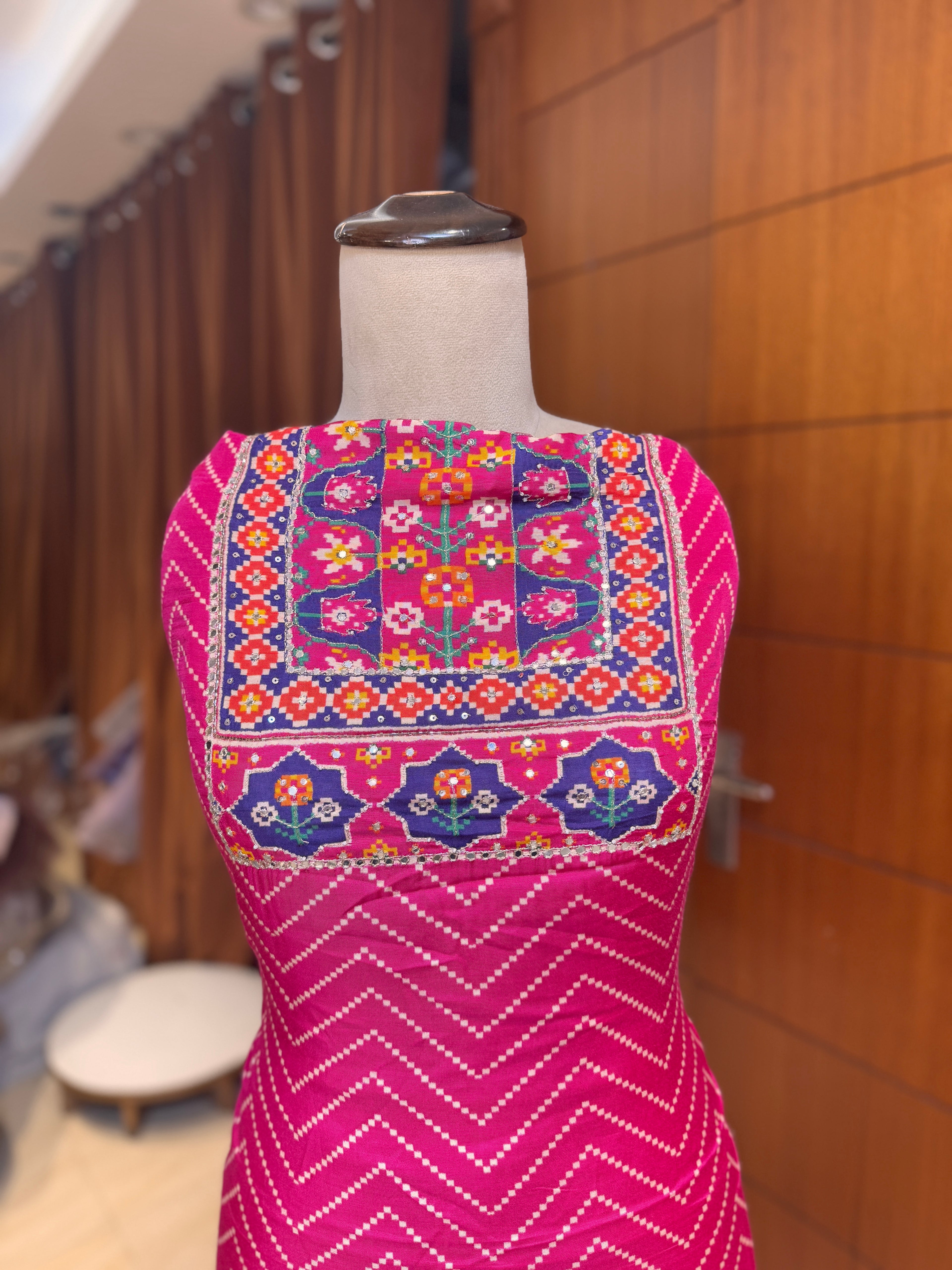 Magenta crepe silk printed suit with handwork detailing on neck