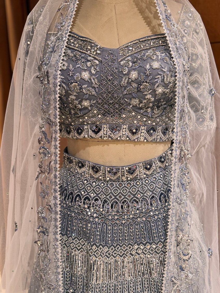 Elegant embroidered traditional outfit with a sheer overlay