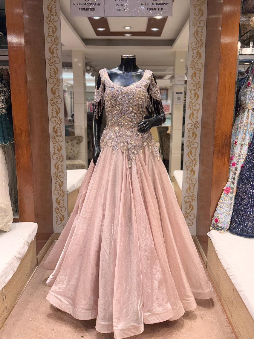 Elegant gown on a mannequin in a store setting