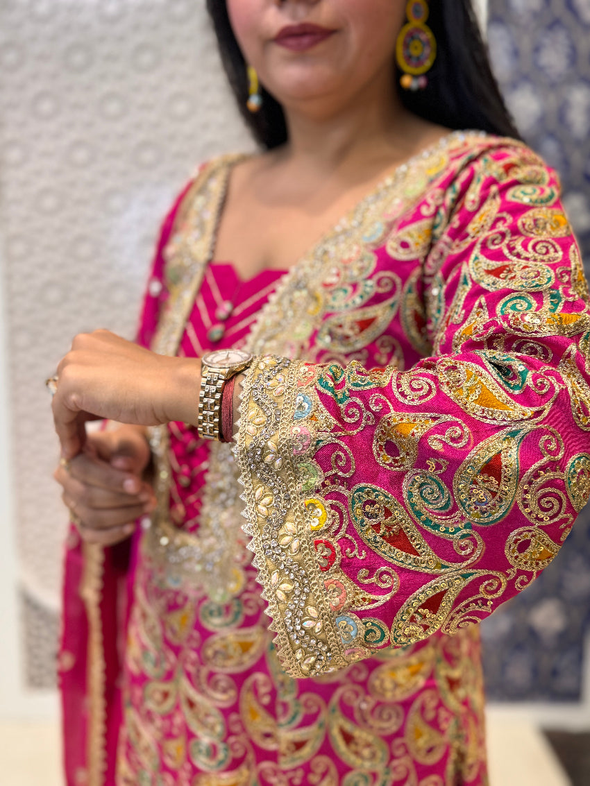 Hot pink Heavy embroidered peplum kurta with tassels and farshi salwar