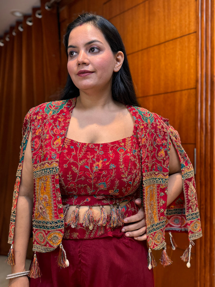 Maroon Indo-Western with heavy embroidery on bustier and multi color shrug
