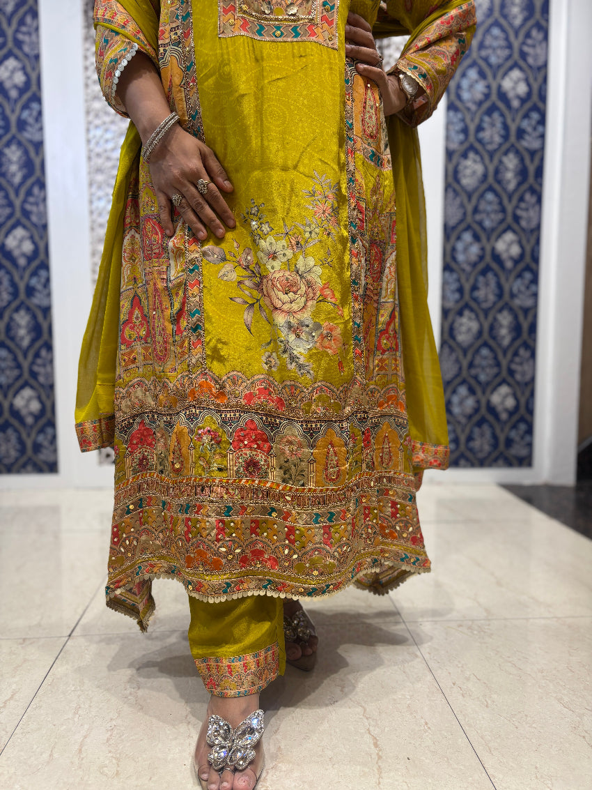 Greenish yellow printed crepe suit with intricate hand work detailing