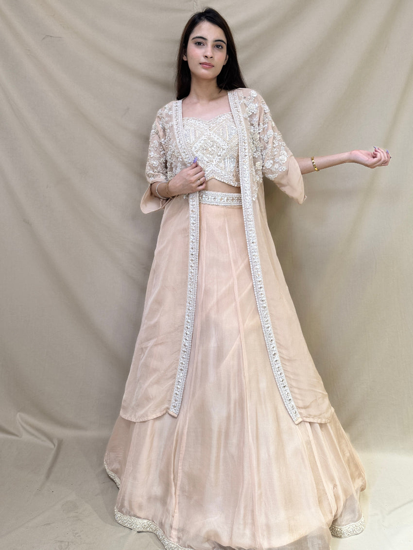 Kiara Advani inspired Ivory colored Hand embroidered Indo-Western lehenga.