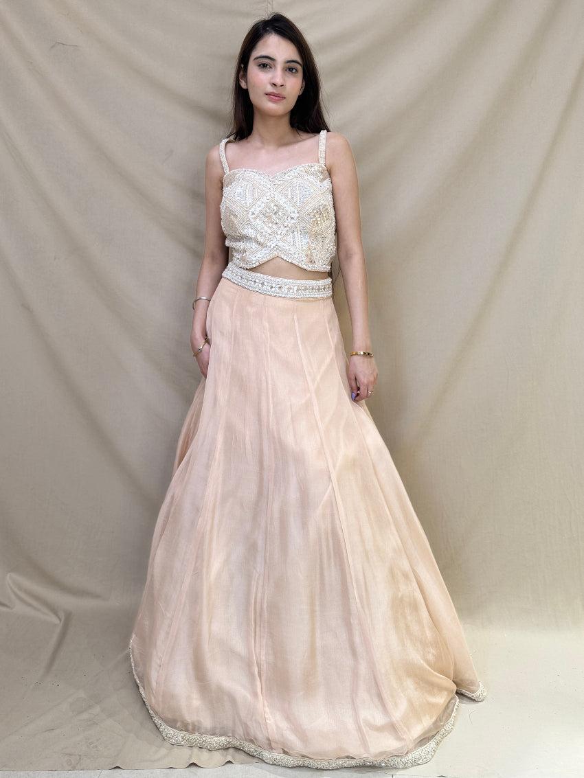 Kiara Advani inspired Ivory colored Hand embroidered Indo-Western lehenga.