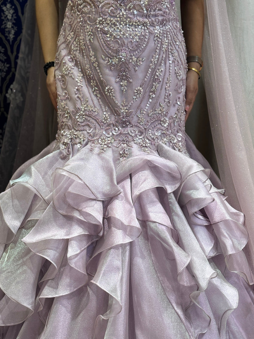 Lavender fish cut wedding gown with hand embroidery and designer sleeves