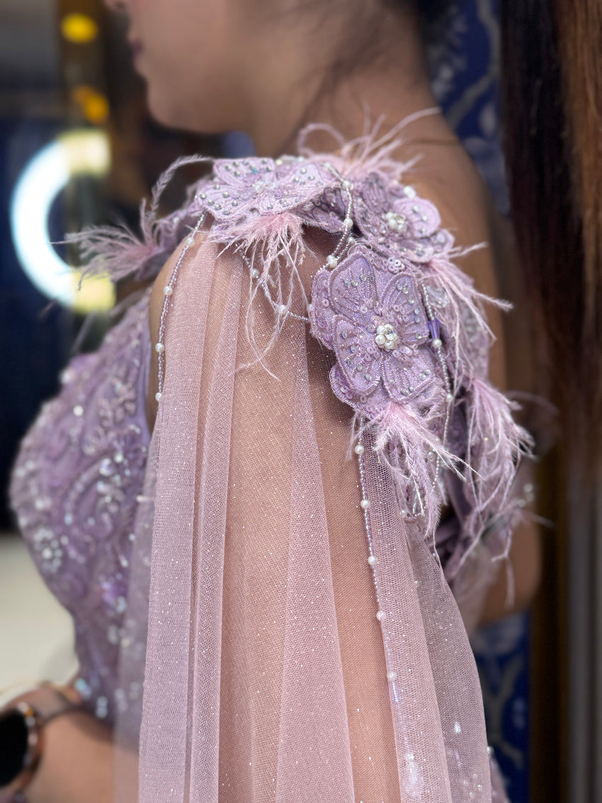 Lavender fish cut wedding gown with hand embroidery and designer sleeves