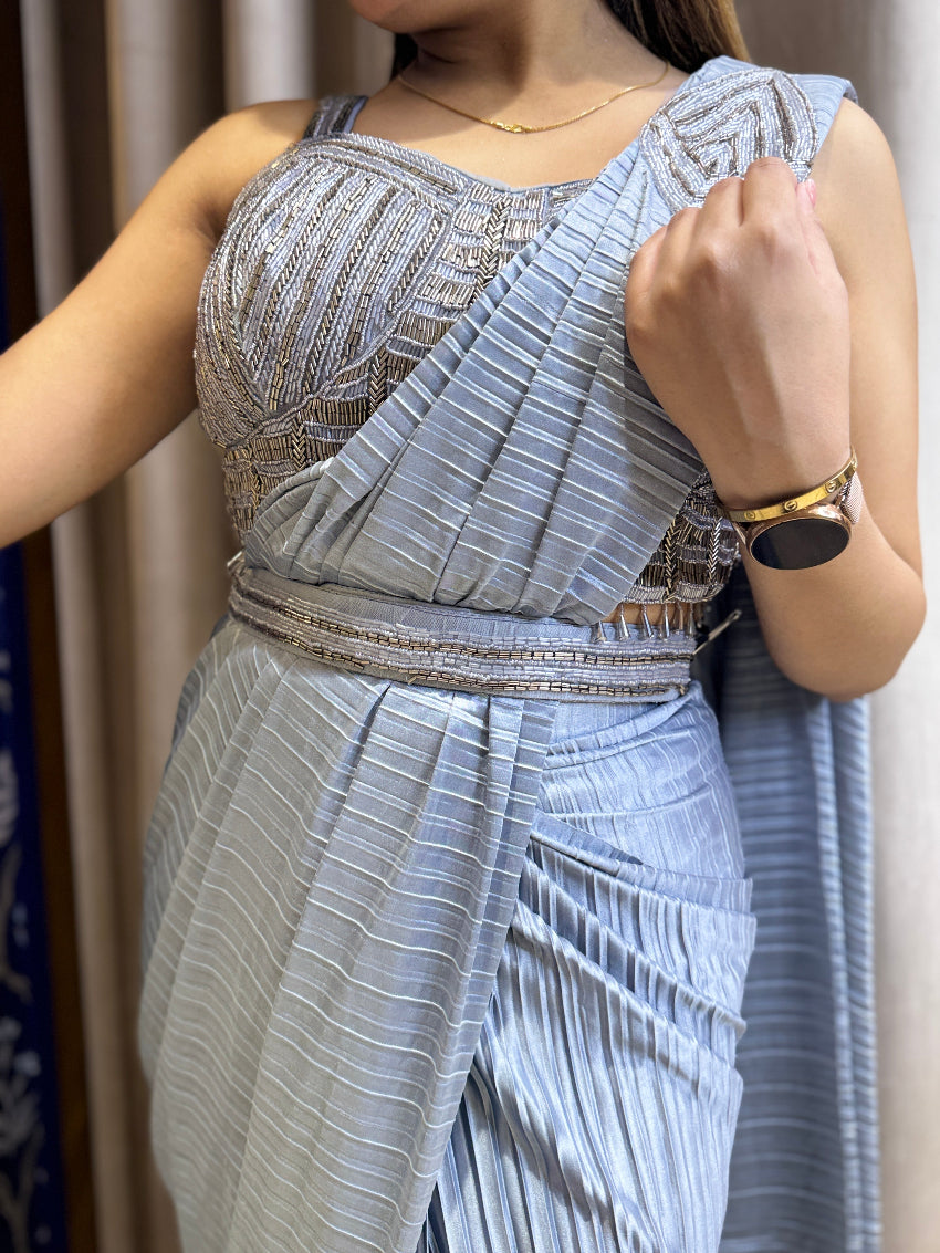 Metallic grey drape saree in pleated fabric with belt and designer bustier