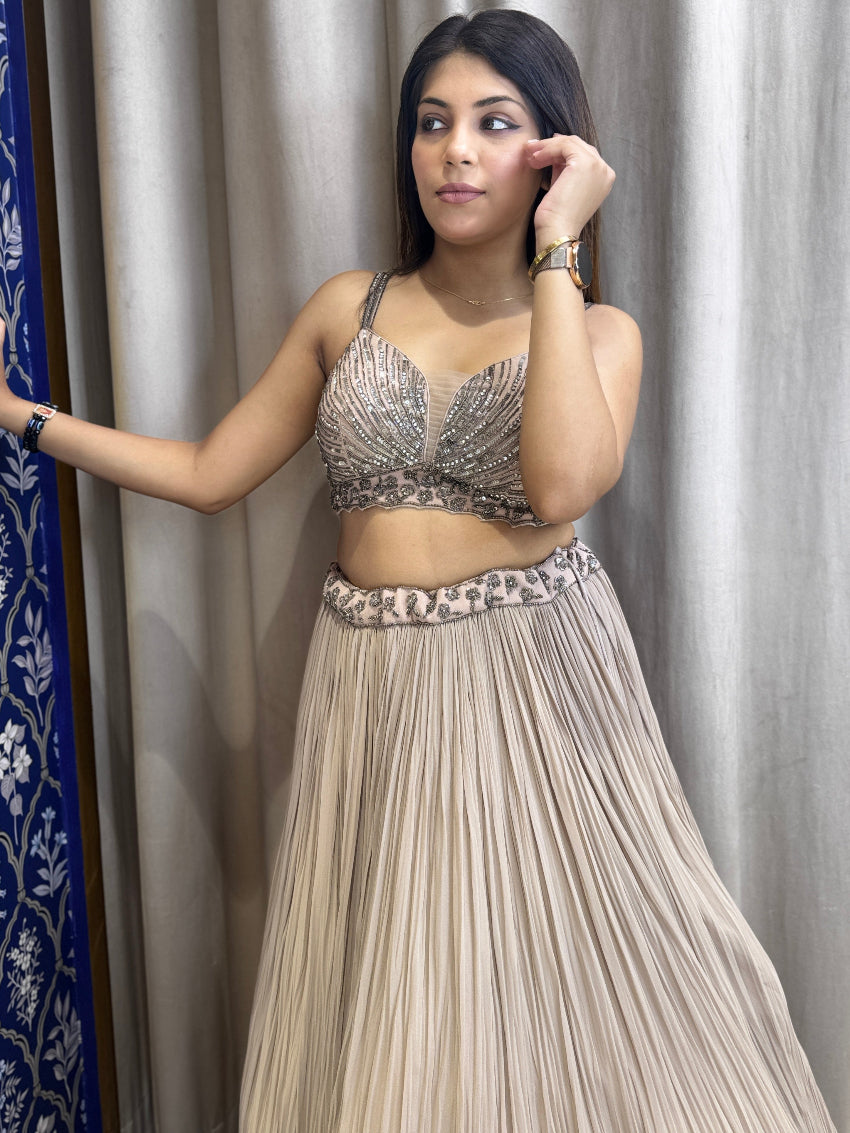 Mocha mousse hand embroidered designer lehenga and bustier with feather cape