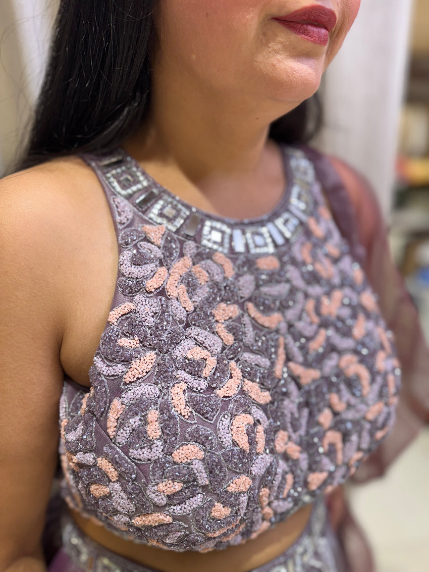 Purple color Heavy embroidered crop top with pleated glass tissue skirt