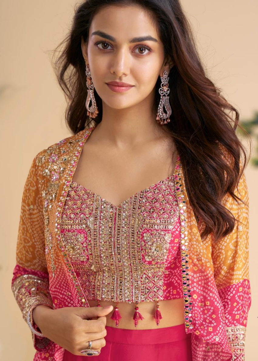 Woman wearing a traditional outfit with pink and orange colors against a beige background