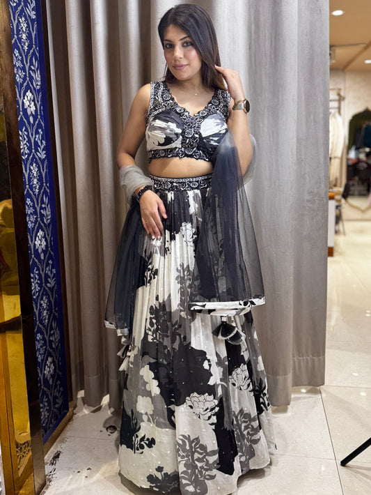 Floral black and white girlish lehenga with hand embroidery on bustier