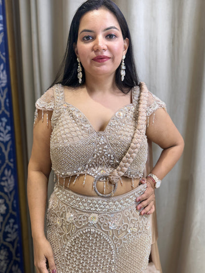 Golden designer fish cut lehenga with braided dupatta