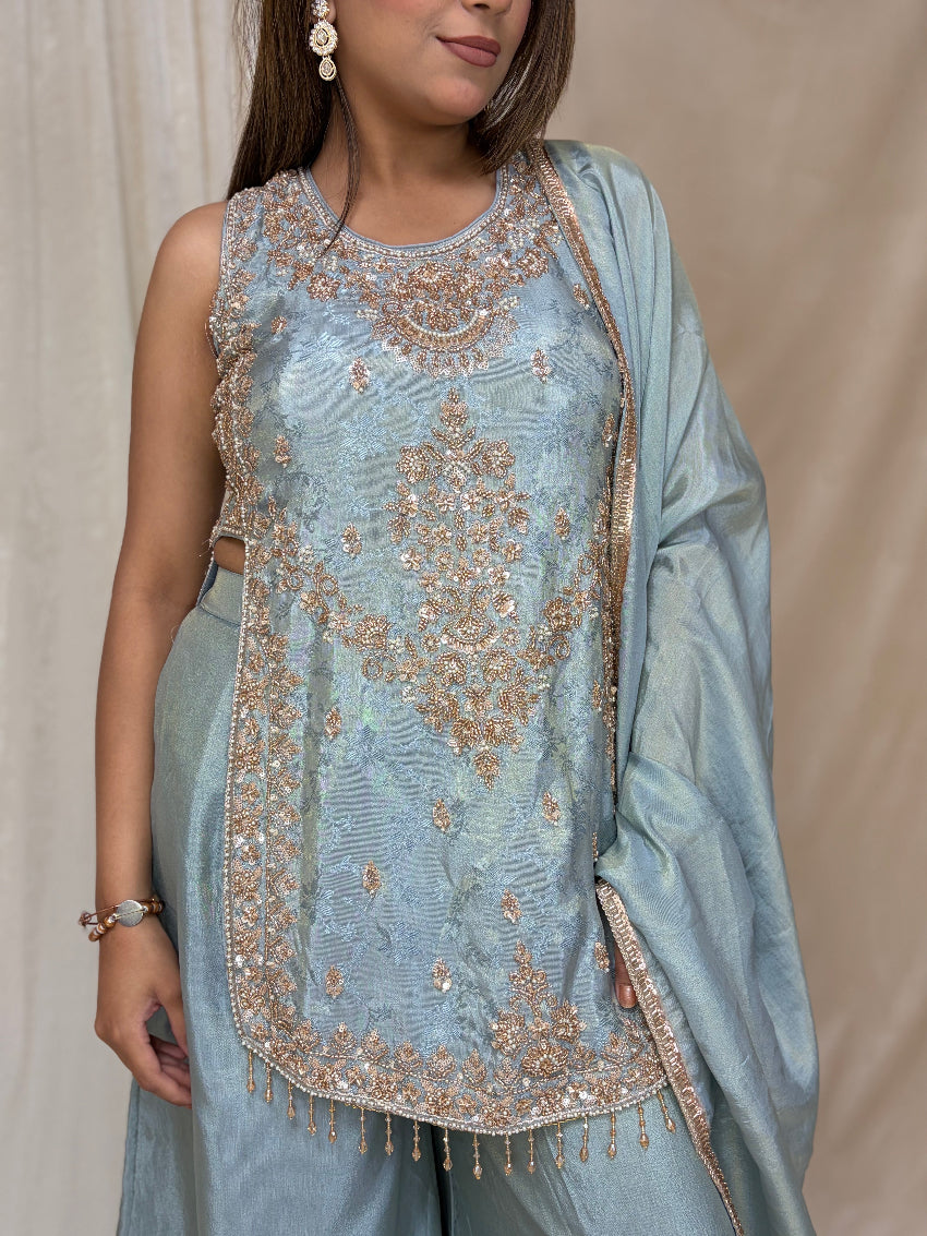 Luxury Powder Blue Straight Kurta Palazzo Set with tassels featuring Intricate beads, kut Dana & Sequin Work