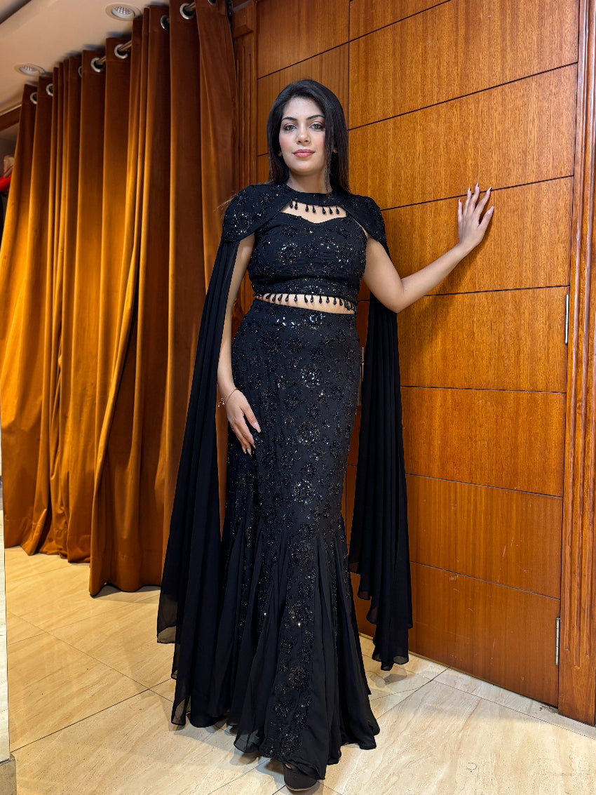 Midnight black embellished fish-cut gown with cape sleeves and bead detailing