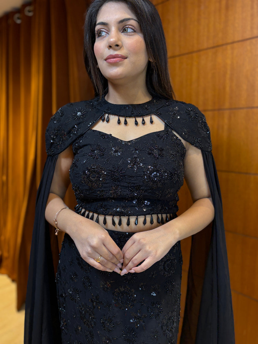Midnight black embellished fish-cut gown with cape sleeves and bead detailing