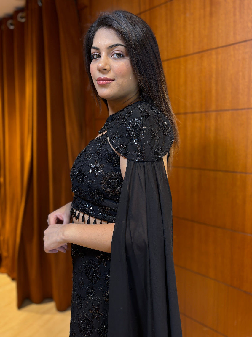 Midnight black embellished fish-cut gown with cape sleeves and bead detailing