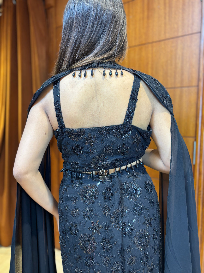 Midnight black embellished fish-cut gown with cape sleeves and bead detailing