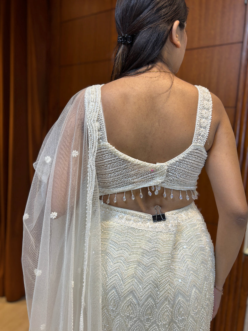 Ivory pearl-embellished fishcut lehenga set with sheer scalloped dupatta