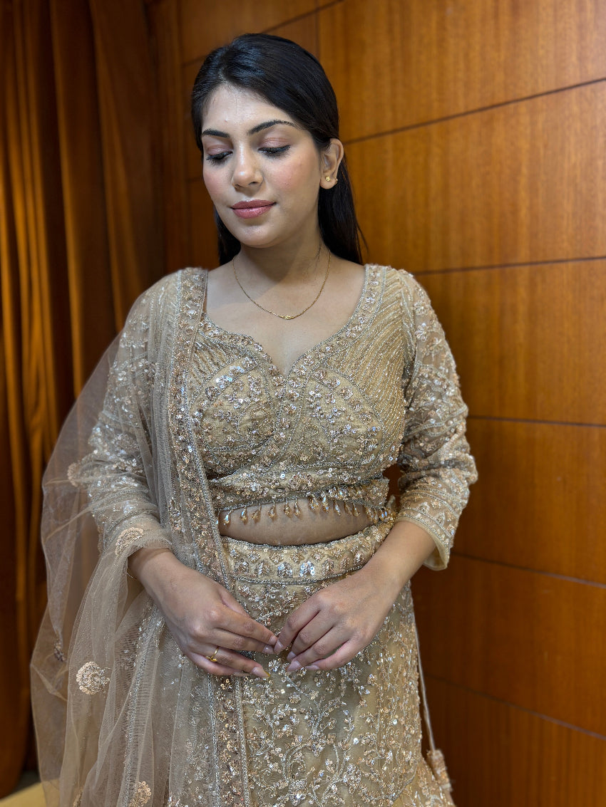 Champagne hand-embroidered fish cut lehenga set with heavy embroidered sheer dupatta