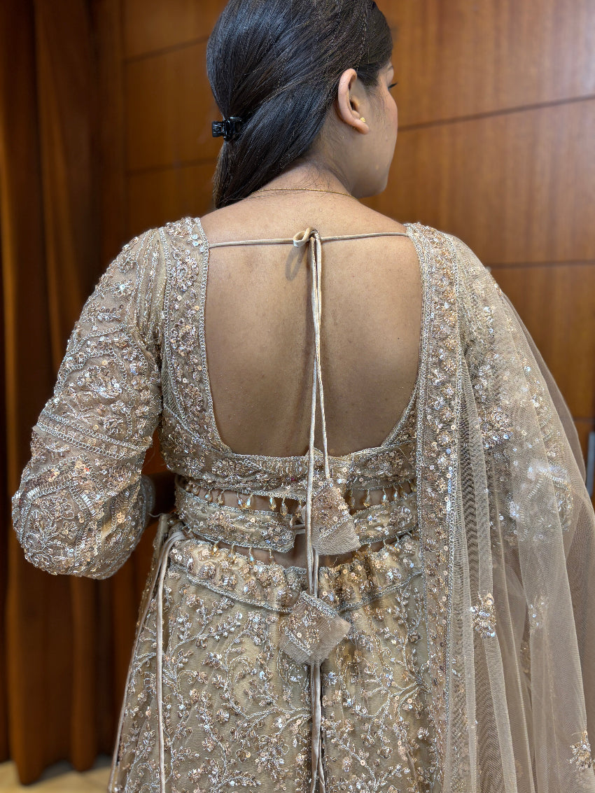 Champagne hand-embroidered fish cut lehenga set with heavy embroidered sheer dupatta