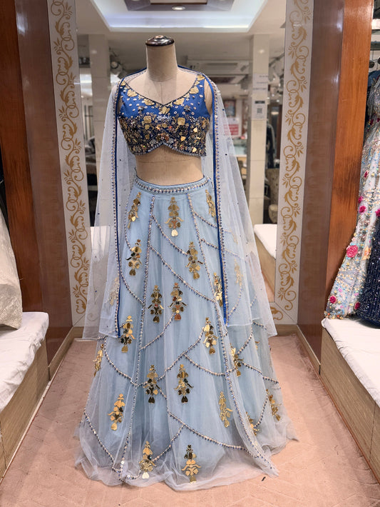 Decorative traditional outfit on a mannequin in a store setting