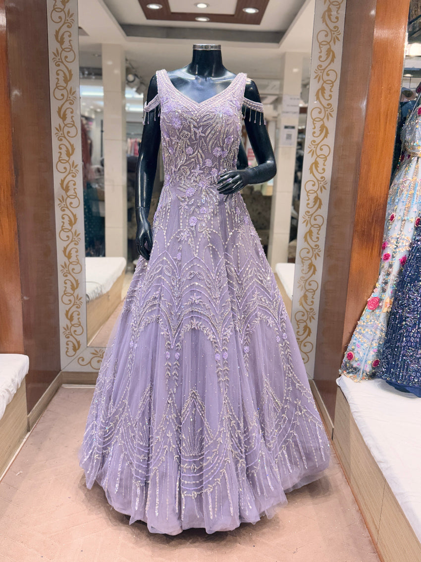 Lavender evening gown on a mannequin in a store setting