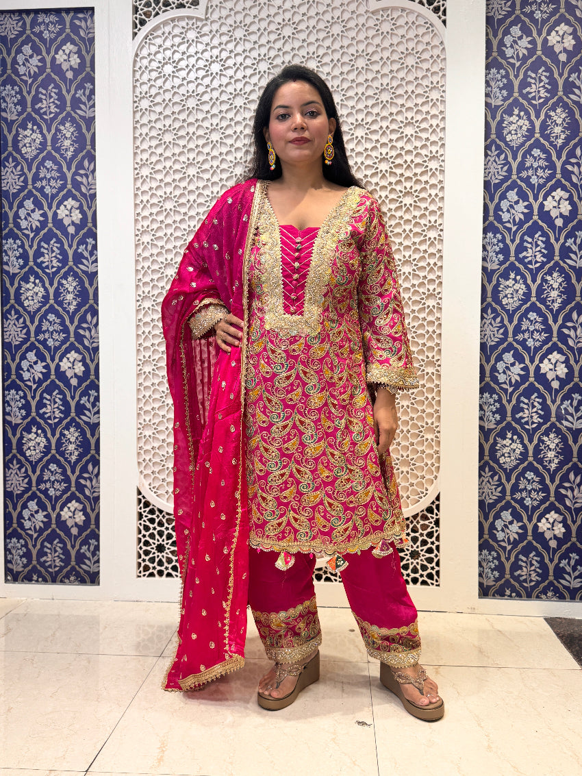 Red Heavy embroidered Anarkali with sharara and hand work detailing