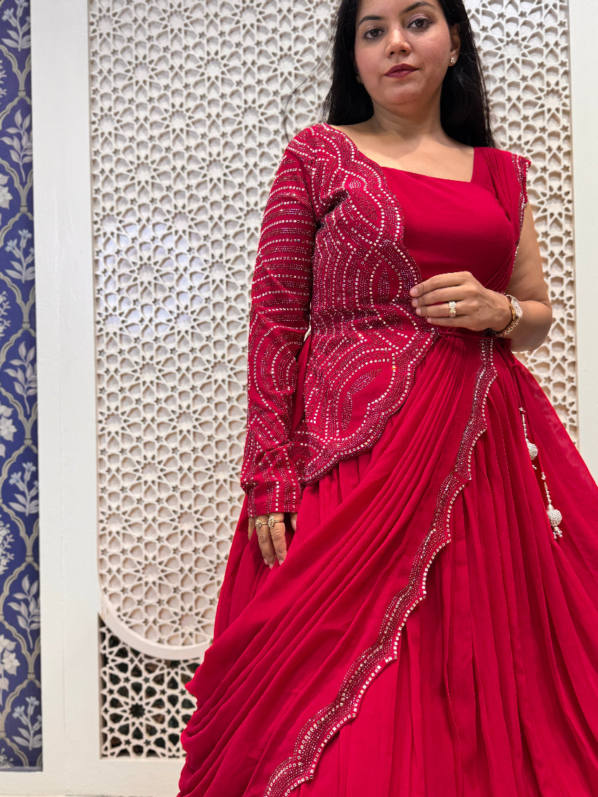 Red indo western gown with drape saree pattern and one side heavy jacket and sleeve