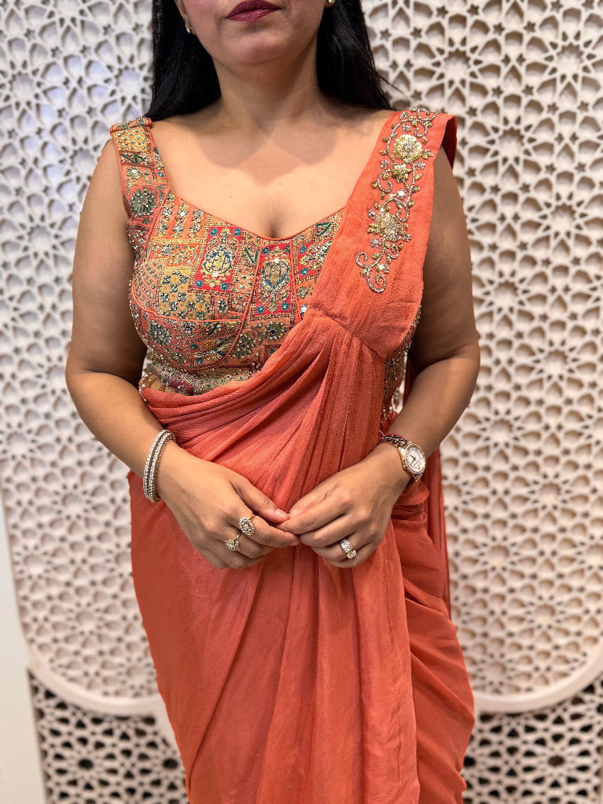 Peach drape saree with heavy blouse