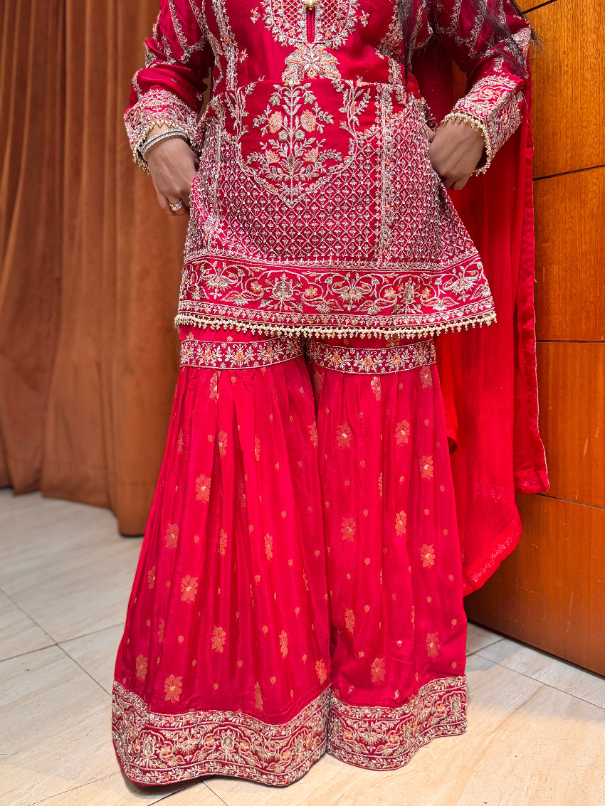 Red heavy gharara suit set with hand work detailing
