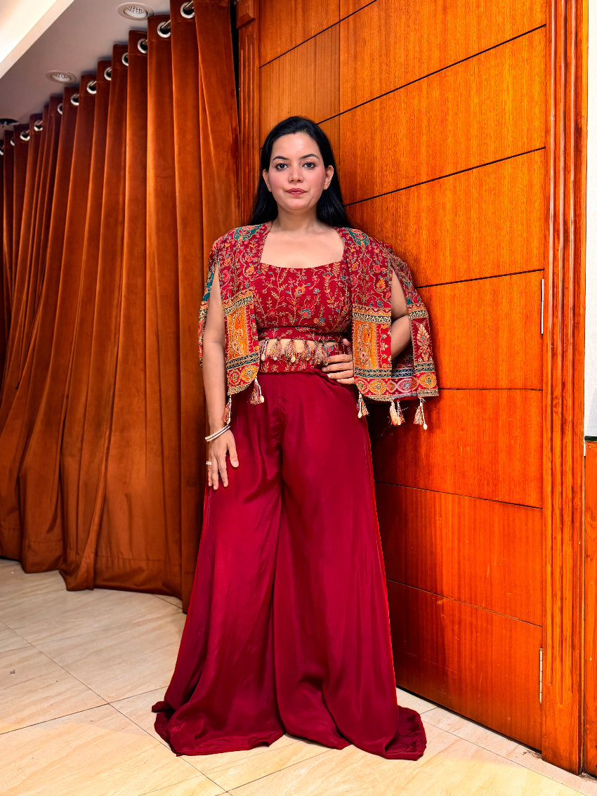 Maroon Indo-Western with heavy embroidery on bustier and multi color shrug