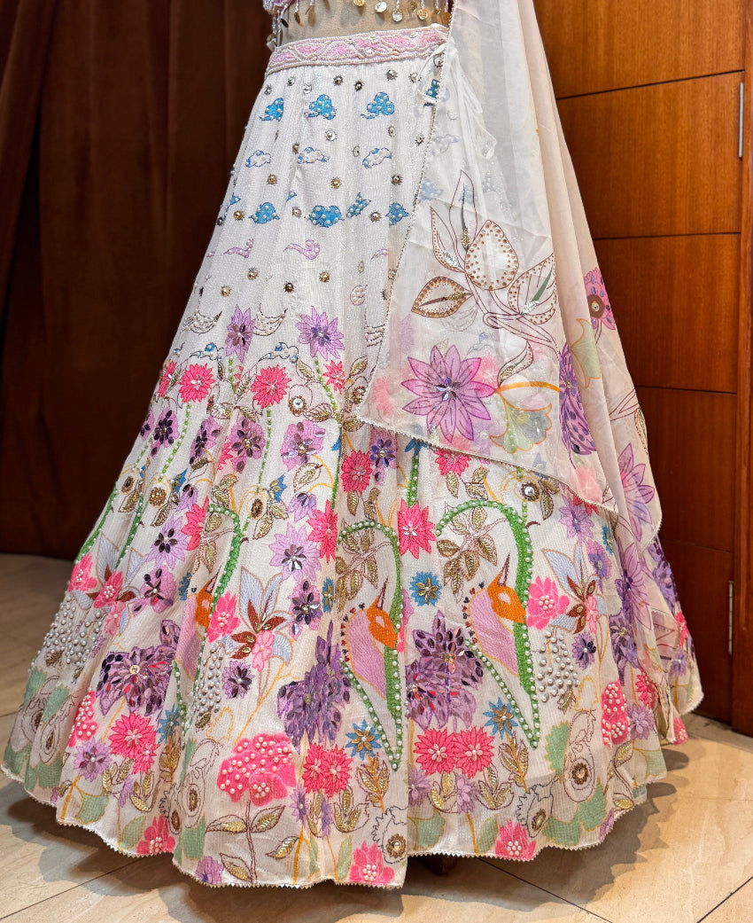 Floral embroidered lehenga with a plain background