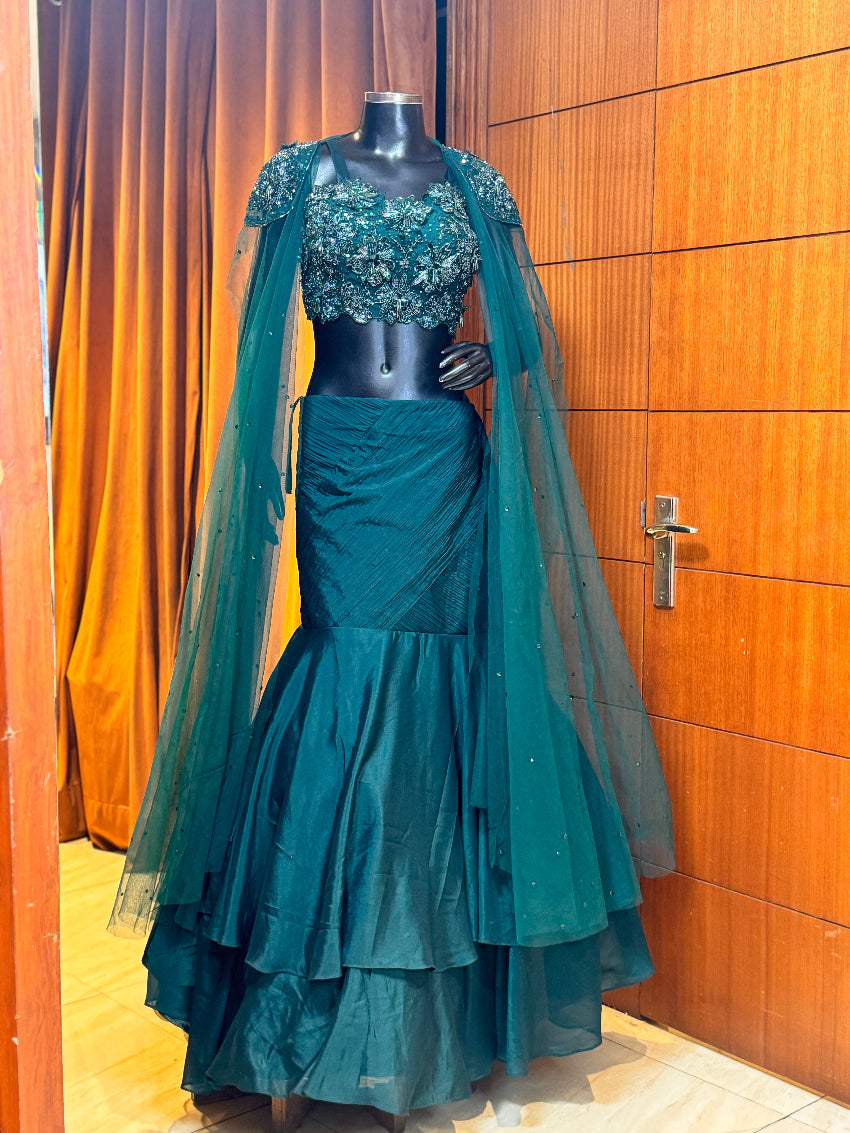 Bottle green Embellished designer bustier and shoulder cape with mermaid lehenga