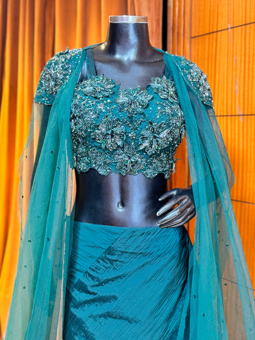 Bottle green Embellished designer bustier and shoulder cape with mermaid lehenga