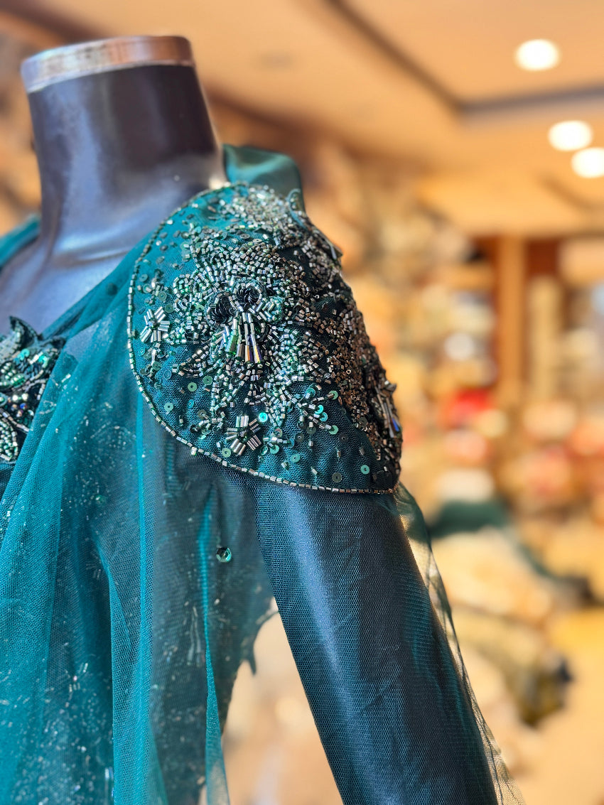 Bottle green Embellished designer bustier and shoulder cape with mermaid lehenga