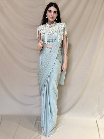 Ice Blue Shimmery Drape Saree With Pearl Cape