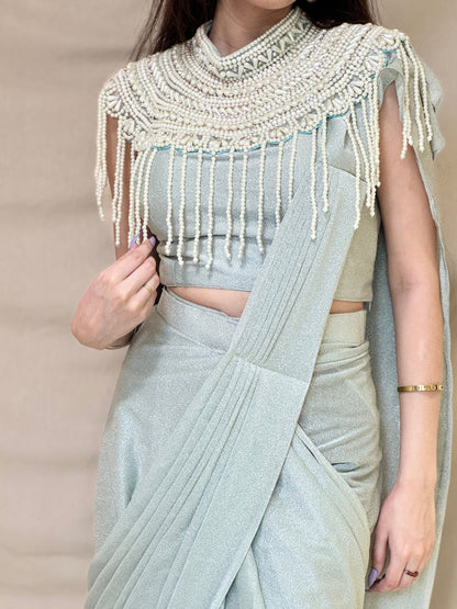 Ice Blue Shimmery Drape Saree With Pearl Cape