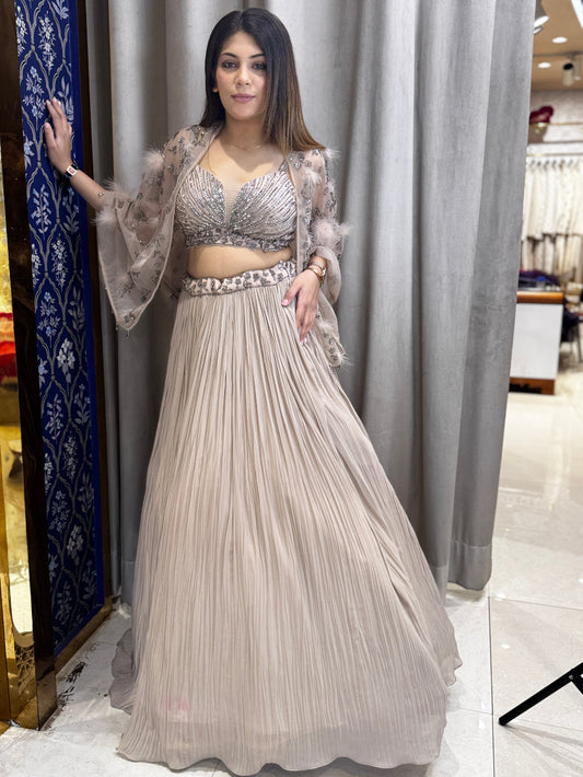 Mocha mousse hand embroidered designer lehenga and bustier with feather cape