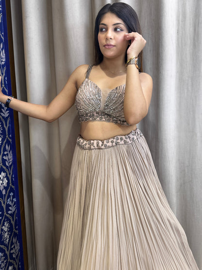 Mocha mousse hand embroidered designer lehenga and bustier with feather cape