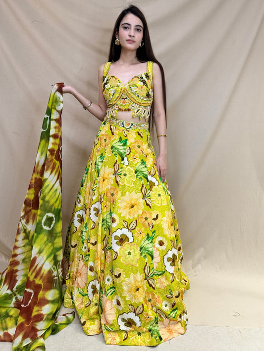Peacock Green Heavy Work Corset Crop Top with Leafy Cut Work, Floral Skirt with Sequin and Embroidered Detailing and Tie and dye Dupatta