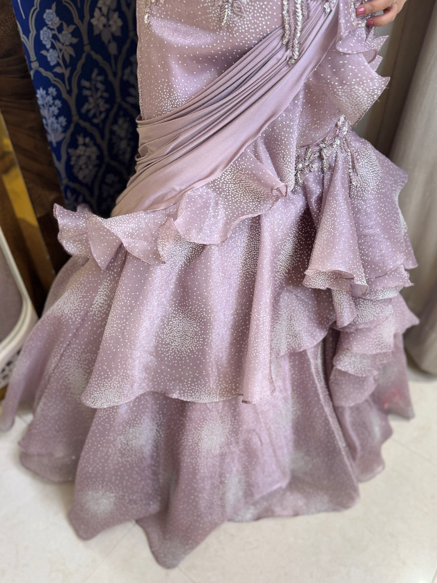 Purple color  fish cut lehenga with layers and hand embroidered blouse with tassels